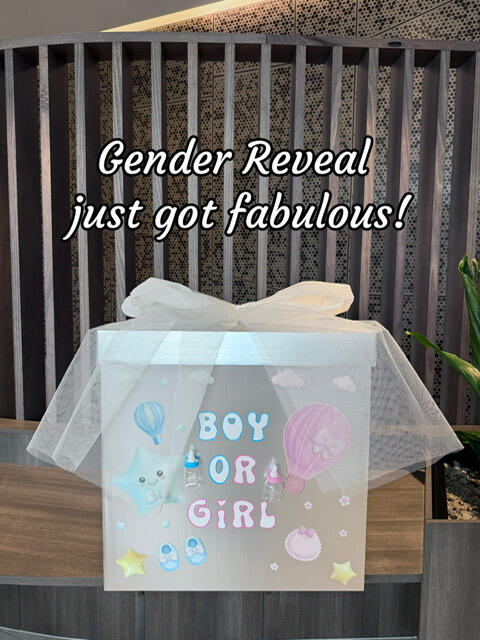 Boy or Girl Gender Reveal Box White gender reveal gift box with soft tulle and pastel designs featuring clouds, stars, and hot air balloons. "Boy or Girl" text on the front. Perfect for a fabulous gender reveal celebration.